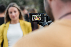 unrecognizable-man-taking-picture-of-smiling-woman-2025-01-09-03-00-18-utc-1